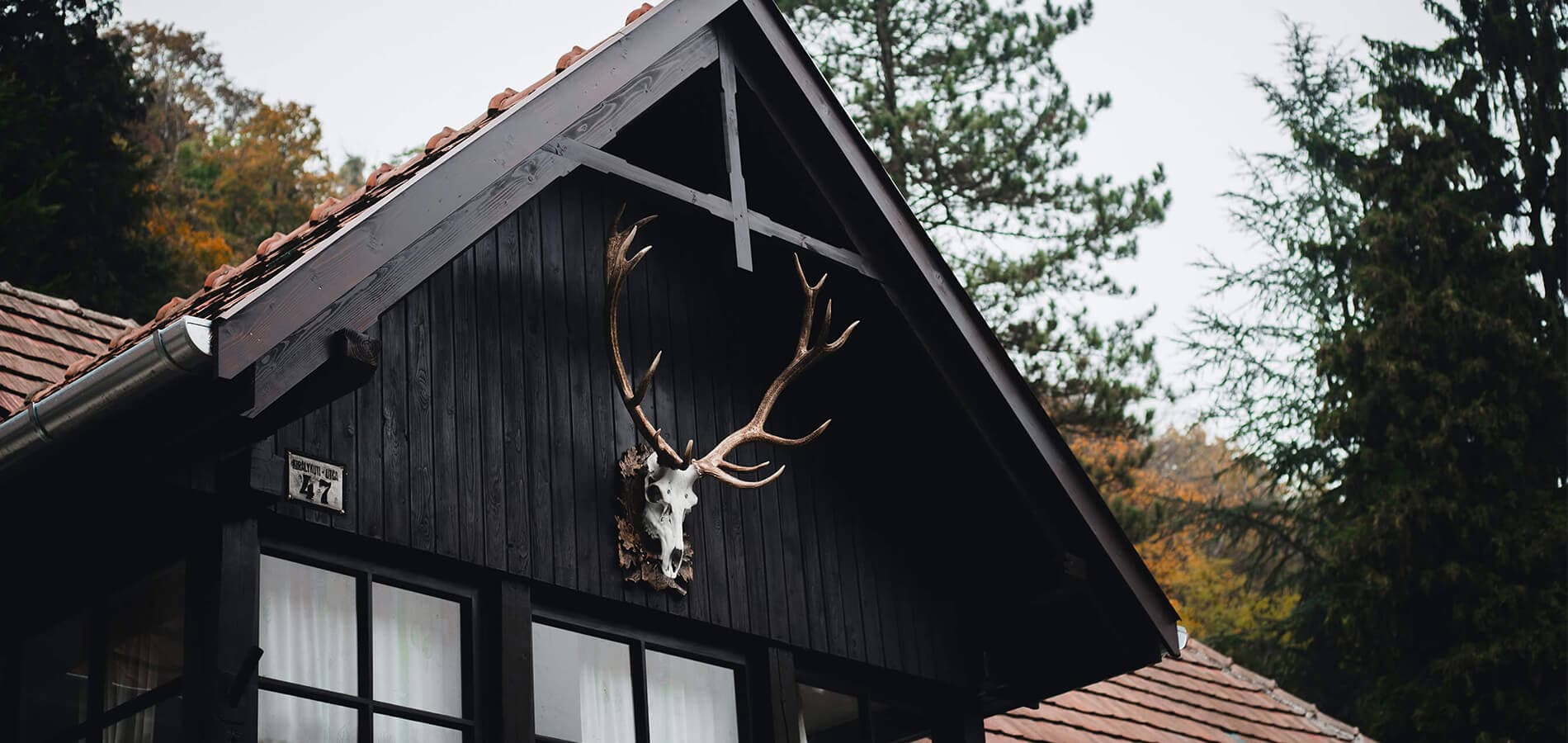 Custom wooden barn-style deck by Westwood Carpentry